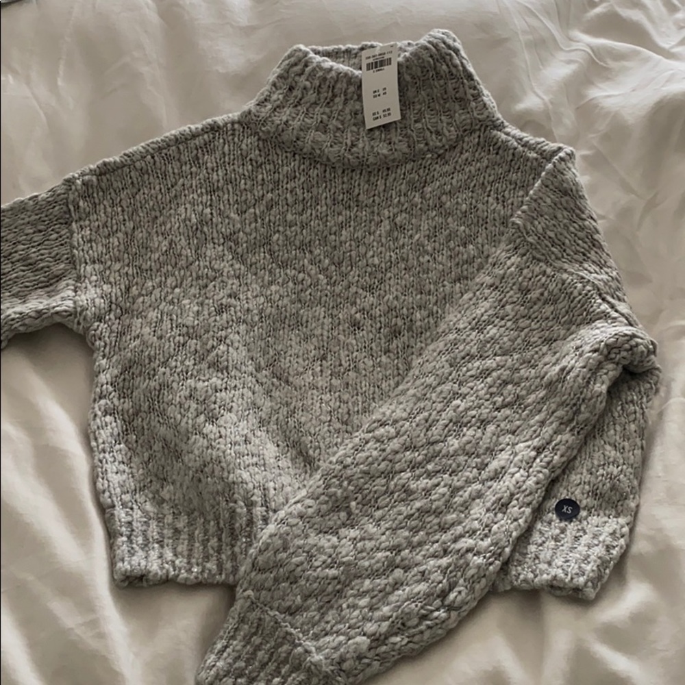 Grey turtleneck sweater